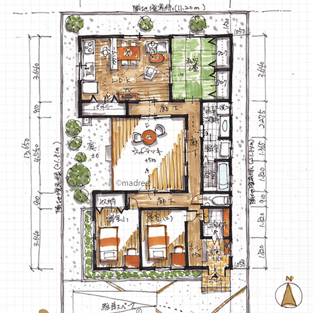 建物中央のプライベート空間、採光デッキに添うコの字回廊のある平屋