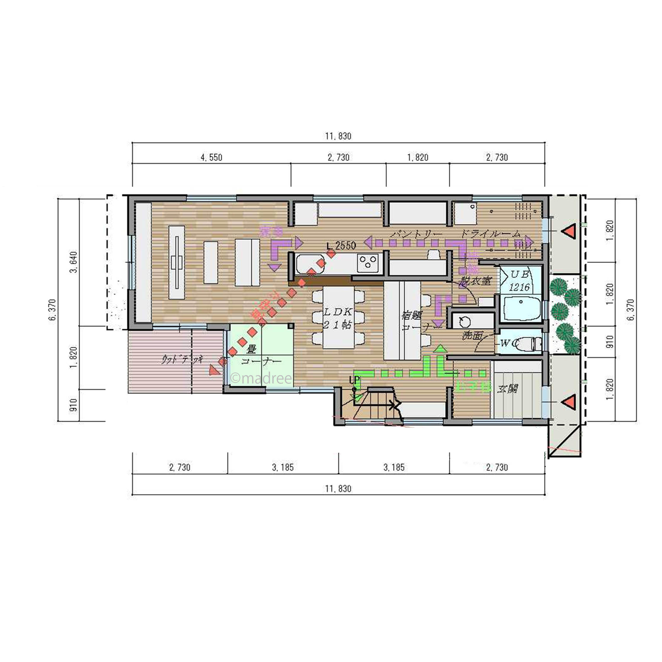 緑あふれる庭の見えるリビングの家